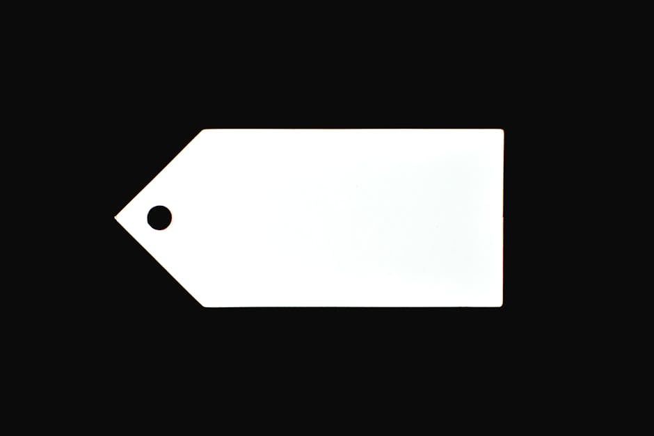 A white blank price tag against a black background, perfect for commercial use.